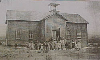 A photo of the first Mountain Home Schoool Building